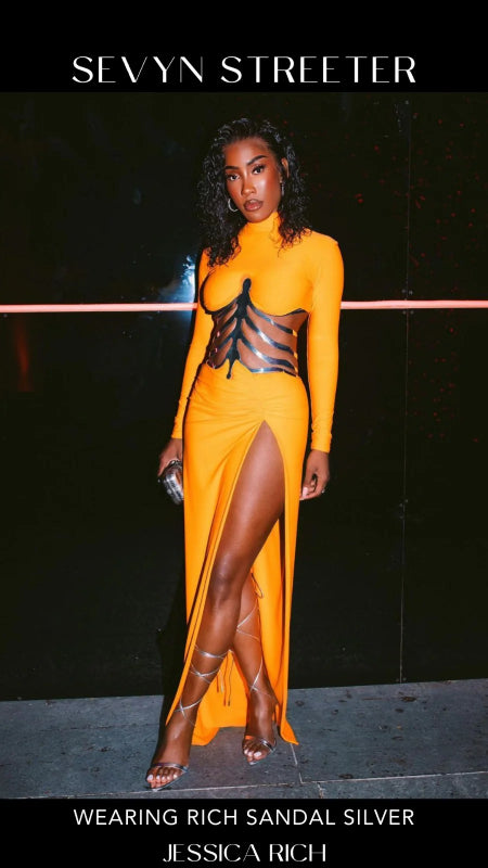 SEVYN STREETER WEARING RICH SANDAL SILVER