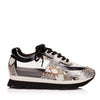 Profile of the glass snakeskin sneakers from luxury women’s shoe brand Jessica Rich.