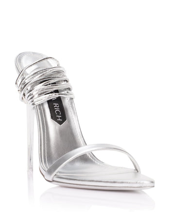 The silver Rich Sandal luxury high heels from Jessica Rich at an angle.