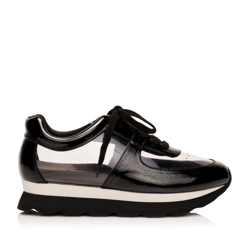 Profile of the glass sneakers from luxury women’s shoe brand Jessica Rich.