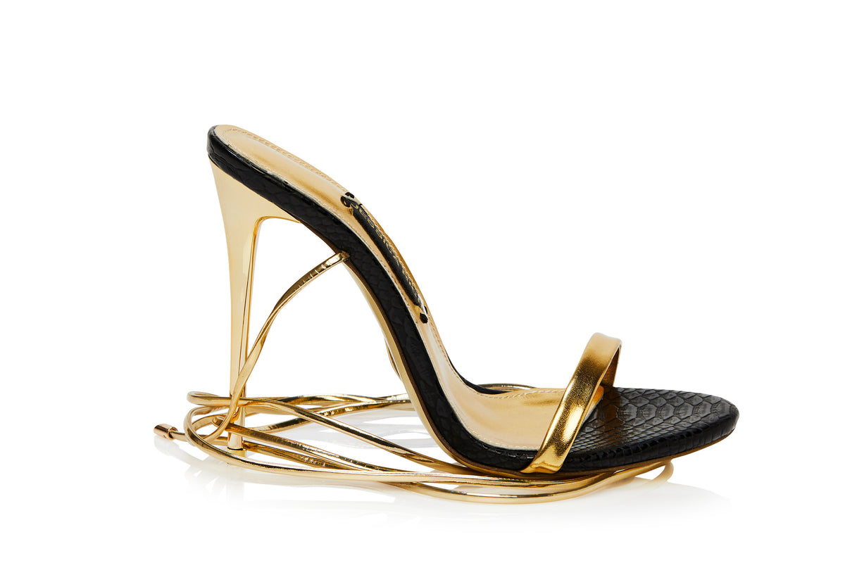 Order metallic heels called Metallic Drip Sandals from Jessica Rich 